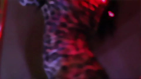 Night club scenes- hot female torso gyrating slow motion pole dance Stock Footage