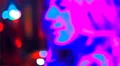 Night club scenes - psycadelic colors appear on hot girl from lights HD Footage