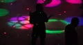 Night club scenes - silhouettes on a dance floor - 2 fun lighting high angle HD Footage