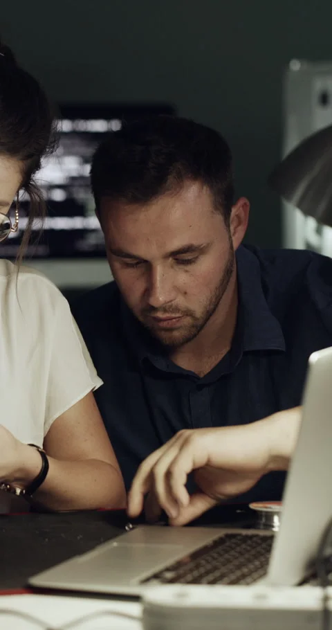 Night, computer and people with hardware for IT repair, maintenance and Stock Footage 329769218