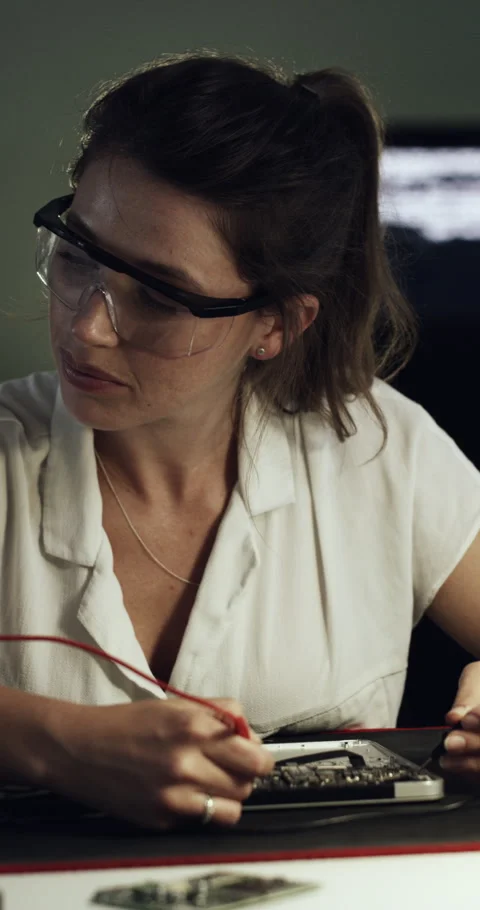Night, computer and woman with hardware for IT maintenance, repair and Stock Footage 329760710