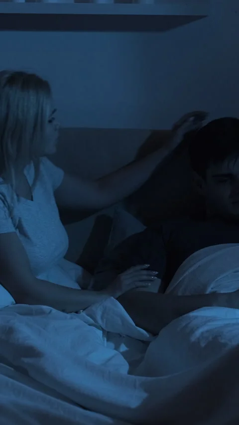 Night couple problem ashamed husband bed vertical Video stock 229865961