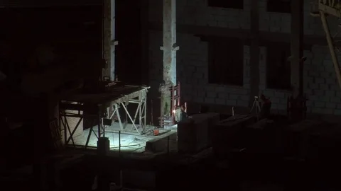 The night crew of builders working on object Stock Footage 74995267