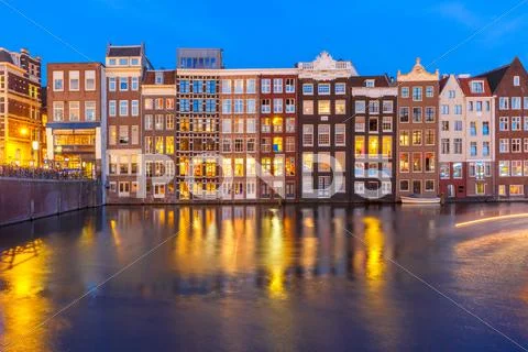 Night dancing houses at Amsterdam, Netherlands Stock Photos