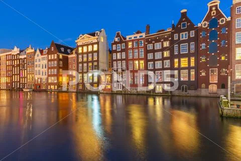 Night dancing houses at Amsterdam, Netherlands Stock Photos