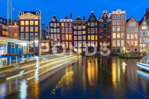 Night dancing houses at Amsterdam, Netherlands Stock Photos