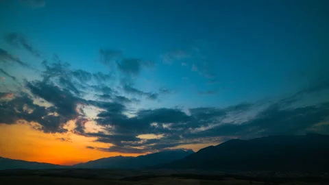 The night to day cycle on the mountain background. time lapse Stock Footage 97387029