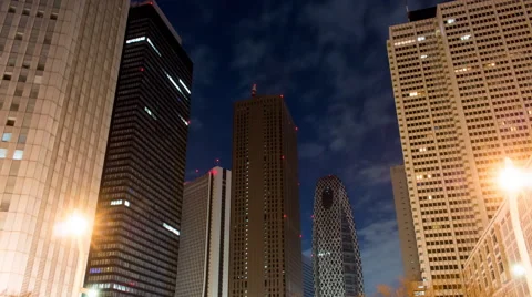 Night to day low angle time lapse in Shinjuku with view of skyscrapers Stock Footage 50503361