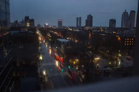 Night to day time lapse shot of traffic on city street, Puerto Madero, Buenos Vídeo Stock 75794319