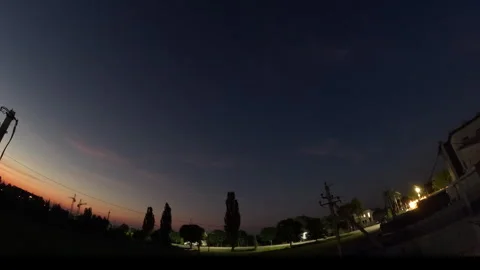 Night to day. Time lapse of starry night, galaxy stars moving Stock Footage 307673551