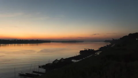 Night to day timelapse of The Sun rising over Mekong river. Stock Footage 155048285
