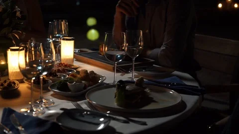 Night dinner with friends at beach 動画素材 128927720