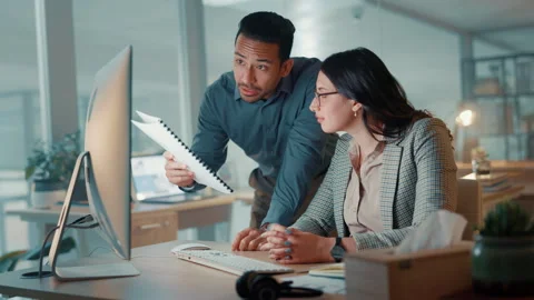 Night, documents or business people with computer, help or cooperation with Stock Footage 310597689