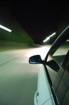 Night drive with car in motion Foto stock