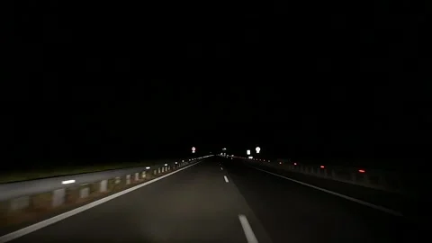 Night driving on an empty highway Stock Footage 162953409