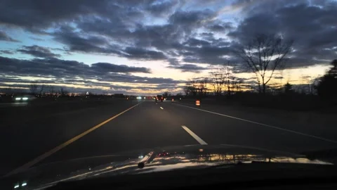 Night Driving on Highway in USA With Construction Pylons Nearby Stock Footage 332010845