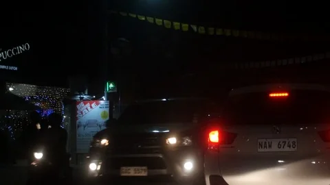 Night driving point of view in the Philippines Stockbeeldmateriaal 127394804