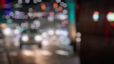 Night Driving Scene with Diffused City Lights Stock Footage 335688077