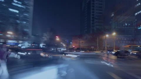 At night, driving through the city streets of Beijing, China，Time Lapse Stock Footage 140845700