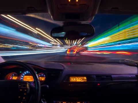 Night driving, view from inside car Stock Photos