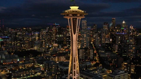 Night drone aerial Seattle Space Needle and downtown cityscape Stock Footage