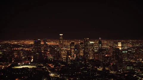 Night drone flight above Los Angeles featuring glowing urban avenues Stock Footage 344389551