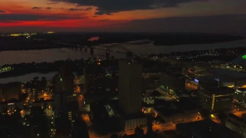 Night drone flight over downtown Memphis Tennessee near Mississippi River Stock Footage 344436473