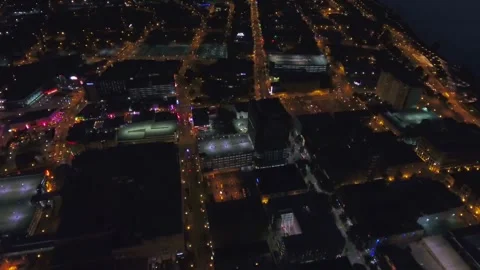 Night drone flight over downtown Memphis Tennessee showing city lights Stock Footage 344436501