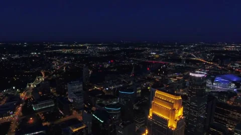 Night drone flight over downtown Minneapolis Minnesota displaying city lights Stock Footage 344520165
