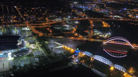 Night drone flight over downtown Nashville Tennessee, Cumberland River Stock Footage 344530373