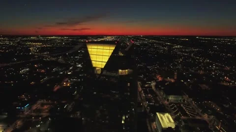 Night drone flight over downtown Oklahoma City, Oklahoma glowing cityscape Stock Footage 344561477