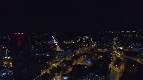 Night drone flight over downtown Rochester New York State city lights Stock Footage 344666641
