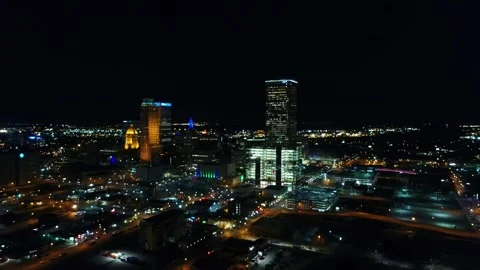 Night drone flight over downtown Tulsa Oklahoma with sparkling lights Stock Footage 344722303