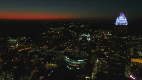 Night drone flight over downtown Charlotte North Carolina and city lights Stock Footage 344779320