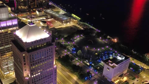 Night drone flight over downtown Detroit Michigan displaying city lights Stock Footage 344787317