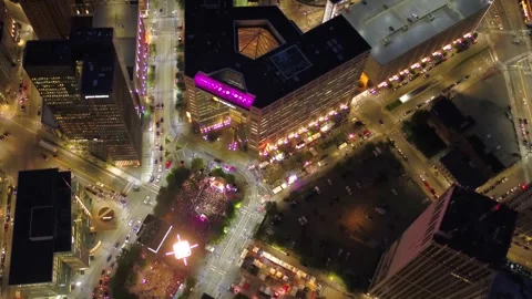 Night drone flight over downtown Detroit Michigan glowing urban streets Stock Footage 344787347