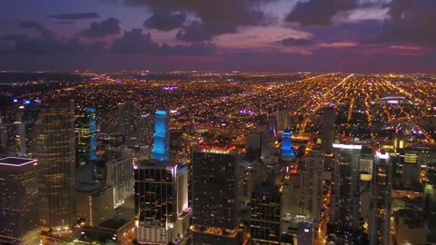 Night drone flight over Miami Florida capturing bright city grid lights Stock Footage 344442031