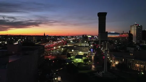 Night drone flight over New Orleans Louisiana with bright city lights Stock Footage 344537482