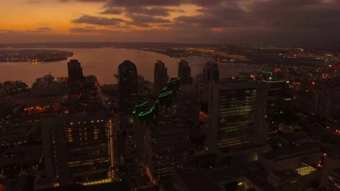 Night drone flight over San Diego California capturing sparkling skyscrapers Stock Footage 344686239