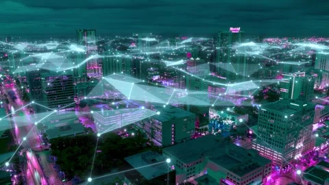 Night drone hyperlapse of a glowing U.S. smart city skyline with luminous data Stock Footage 320870487