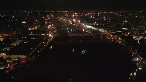 Night Drone View of fireworks over Cologne city and Rhine river, Germany Stock Footage 326463779
