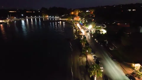 Night drone view of the Ipsos, Corfu coastline. Stock Footage 321214380