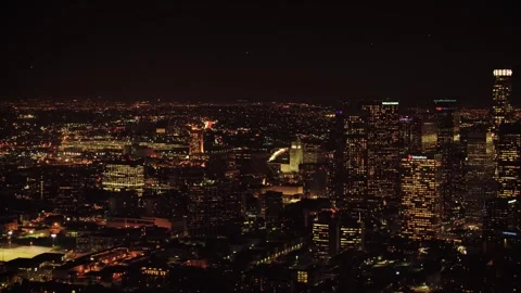 Night drone view over downtown Los Angeles showing glowing towers Stock Footage 344389712