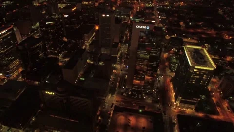 Night drone view over downtown Phoenix Arizona featuring glowing towers Stock Footage 344628068