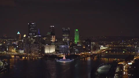 Night drone view over downtown Pittsburgh Pennsylvania with city lights Stock Footage 344631382
