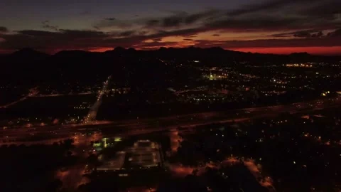 Night drone view over downtown Tucson Arizona showing cityscape lights Stock Footage 344719676