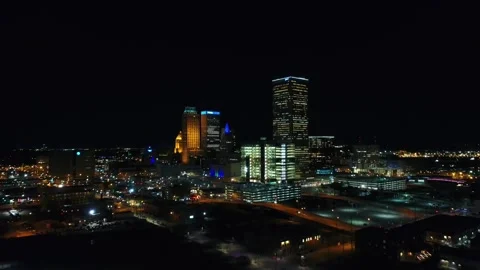 Night drone view over downtown Tulsa Oklahoma showing cityscape lights Stock Footage 344722306