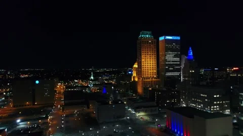 Night drone view over downtown Tulsa Oklahoma with glowing skyscrapers Stock Footage 344722330
