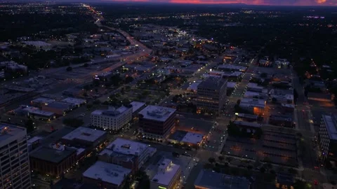 Night drone view over downtown Boise Idaho showing cityscape lights Stock Footage 344739760
