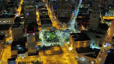 Night drone view over downtown Cleveland Ohio with glowing skyscrapers Stock Footage 344780502